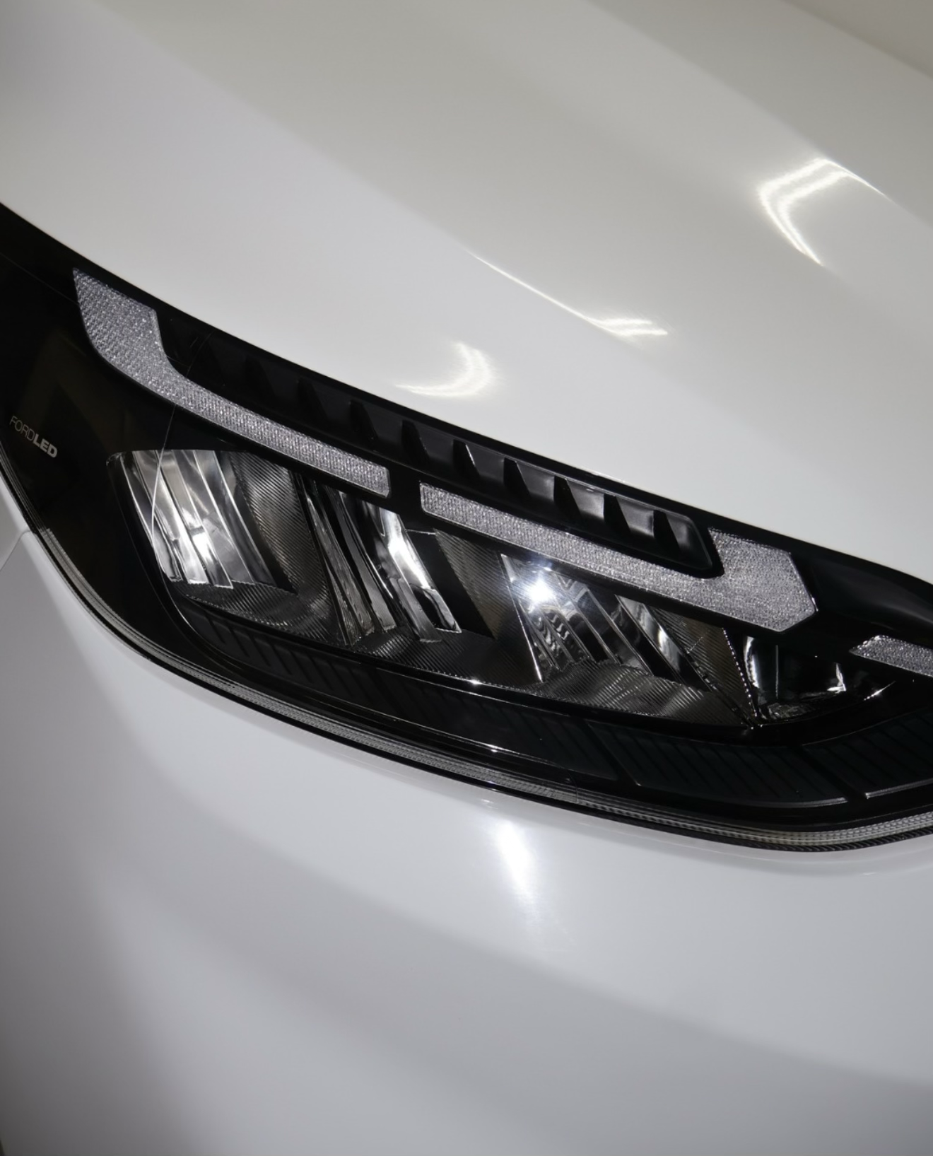 Luxury Auto Care showroom-level headlight restoration result